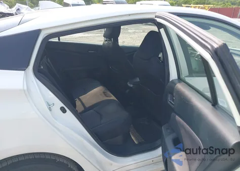 2021 Toyota Prius Le из США, поврежденный, VIN JTDKAMFU7M3147668